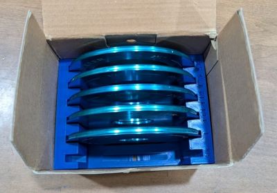 An image of the ring holder in the original box