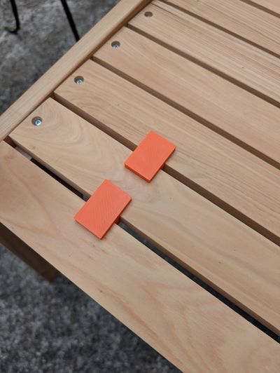 An image of the spacers in use on the assembled love seat