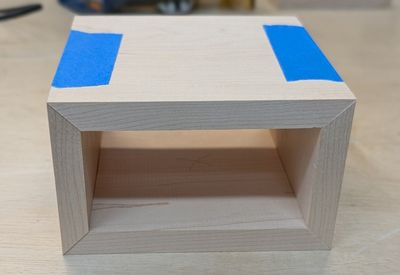 An image of a partially assembled box with chamfered corners