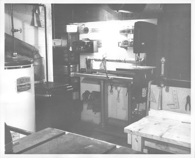 A photo of my father's lathe and band saw